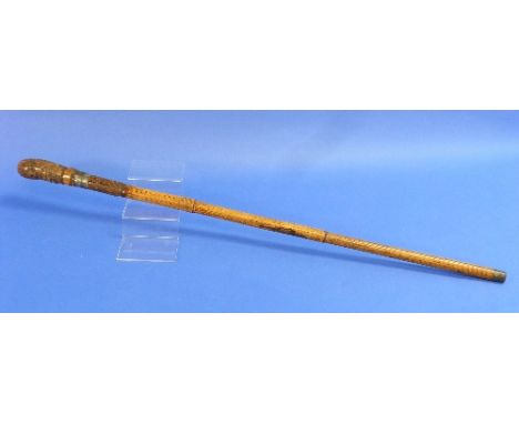 A 19th century bamboo Sword Stick, with bamboo root handle and 18in (45.5cm) blade, overall 36in (91.5cm) long.