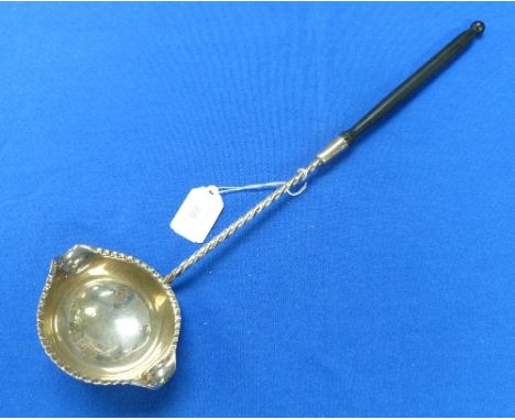 A George VI silver double lipped Ladle, by Harrods Ltd (Richard Woodman Burbridge), hallmarked Sheffield 1938, with twisted h