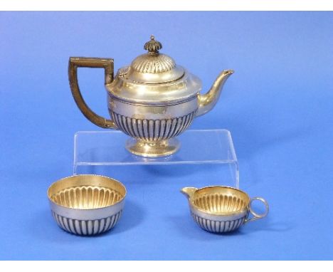 A late Victorian silver three piece Tea Set, by Mappin & Webb, hallmarked Sheffield, 1894 / 1895, he teapot of circular form 