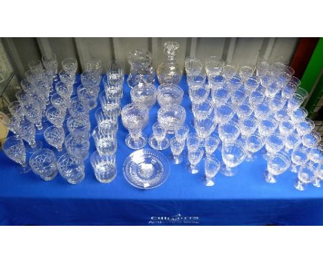 An extensive suite of Stuart Crystal Glasses, Arundel Cut, including: twelve champagne flutes, thirteen white wine glasses, e