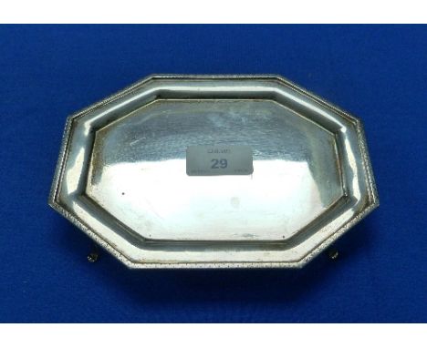 A George V silver Teapot Stand, by Thomas Bradbury & Sons Ltd.,hallmarked Sheffield 1923, of octagonal form, the edge with br