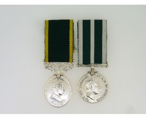 Royal Navy Reserve Long Service and Good Conduct medal, awarded to 10017 E.V. G. Darby. Engn. R.N.R., and an Efficiency medal