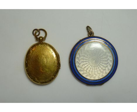 An oval yellow gold hinged Locket, with a scrolling floral border, and engine turned design, tested as not less than 14ct, to