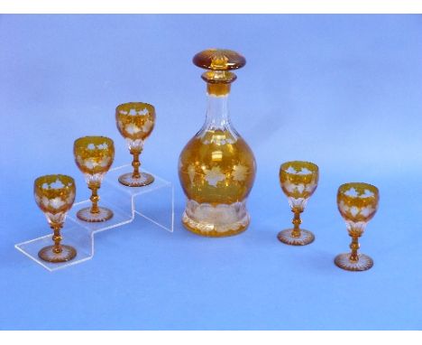 A late 19thC Bavarian amber-flashed Decanter and stopper, of fluted form, engraved with a band of fruiting vine, 11in (28cm) 