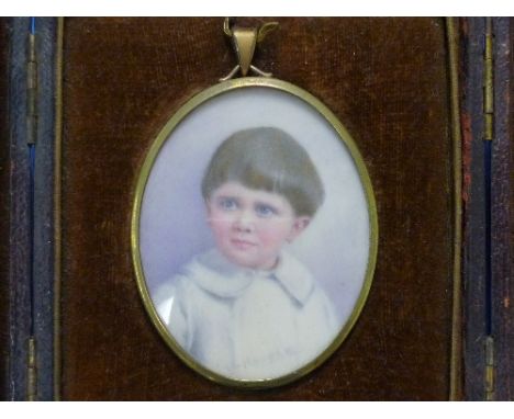 Early 20thC English School, Portrait miniature of a young boy with blue eyes, watercolour, oval, signed Hooper, in gilt metal