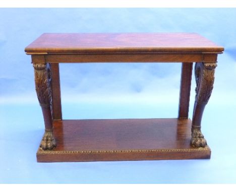 A William IV mahogany Console Table, the rectangular top upon scrolling acanthus leaf carved supports, terminating in bold li