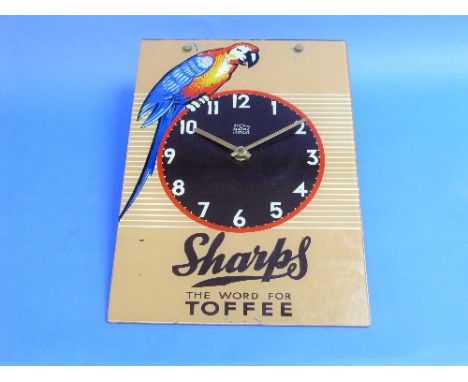 A vintage 'Sharps the Word for Toffee' advertising hanging electric Wall Clock, by Sectric & Mains Time Co. Ltd., London E.G.