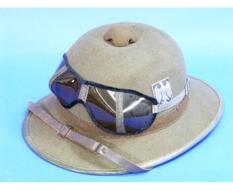 A DAK (Deutsches Africakorps) Topi, with army badges and sand goggles, possibly officers issue. 