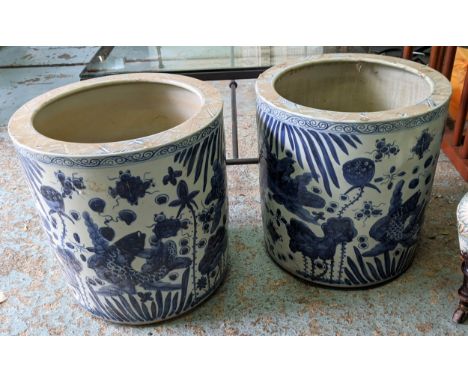 PLANTERS, a pair, 50cm high, 48cm diameter, Chinese export style blue and white ceramic. (2) 
