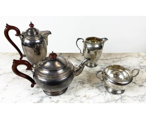 SILVER TEA AND COFFEE SERVICE, four piece London 1933, with Goldsmiths and Silversmiths mark and bakelite handles, approx 54 