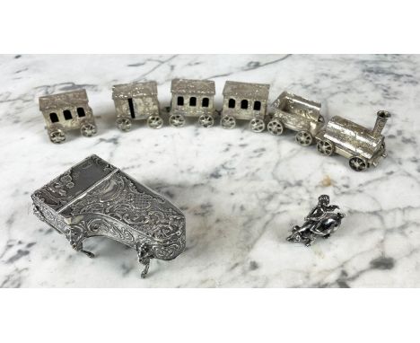 MINIATURE SILVER TRAIN, German for Dutch market, 800 silver C.1900, with engraved tender and four sterling silver CARRAIGES p