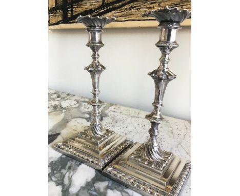 CANDLESTICKS BY MAPPIN AND WEBB, a pair, silver plated, 18th century style with knopped stems and stamped and engraved 'Mappi