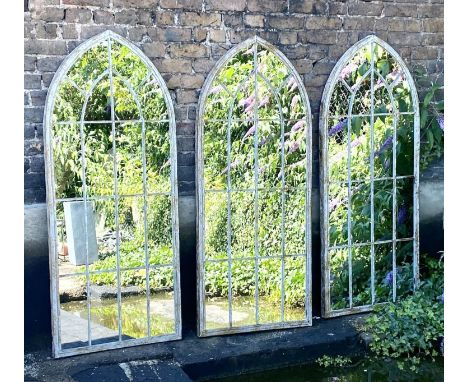 ARCHITECTURAL WALL MIRRORS, 160cm high, 67cm wide, set of three, Gothic style, arched design aged painted, metal frames (3) 