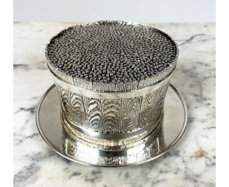 SILVER CAVIAR SERVER, having a ball textured lid enclosing a glass bowl on stand with naturalistic ash bark textured body on 