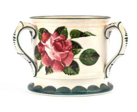A Wemyss pottery tyg, painted with three roses within foliage, the base with impressed maker's mark, H 10cm, Diam: 10.5cm