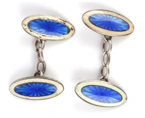 A pair of oval silver cufflinks, with blue and white enamelling, hallmarked to back. Condition Report:  Gross weight 7 grams 