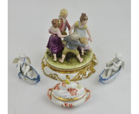 Herend, a sugar bowl and cover and a Sweet meat server and cover, together with a Neapolitan porcelain figure of a group of p