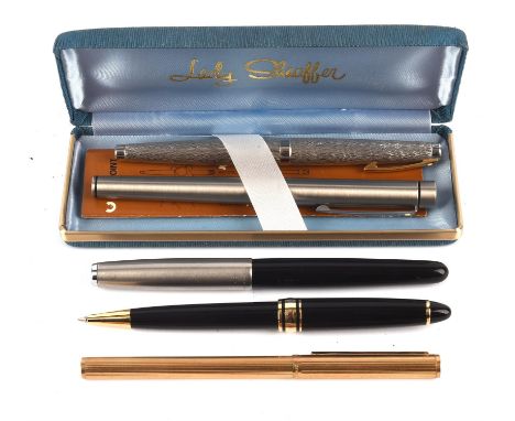Five vintage pens, including two Sheaffer fountain pens, one with a 14 ct nib, a gold plated Rambold pen without its and a Pa