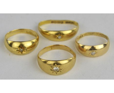 Four gypsy set diamond rings, three set with old cut diamonds, one set with a round brilliant diamonds, all in 18 ct, sizes J
