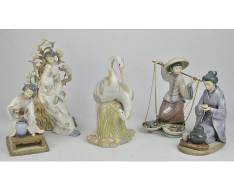 Seven Lladro porcelain figures depicting Asian females including ; Fish a Plenty, My Precious Bundle, Geisha Girl with Fan an