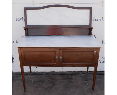 An Edwardian mahogany and inlaid washstand, with marble splashback and marble top, with two doors, on square tapered legs wit