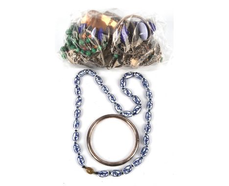 A group of silver and costume jewellery, including vintage Venetian millefiori glass necklace, malachite bead necklace, cat b