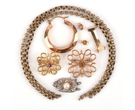 Two gold brooches, one set with a ruby measuring 28mm x 28mm and the larger with pin and lock fastening measuring 20mm x 20mm