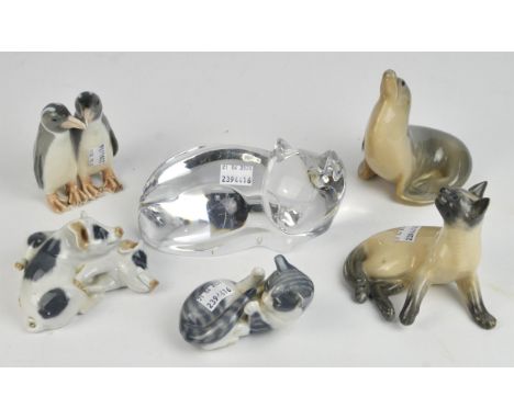 Five Royal Copenhagen porcelain animal groups comprising ; Seal No 1441, Cat No727, Pigs No 683, Penguins No 1190 and Siamese