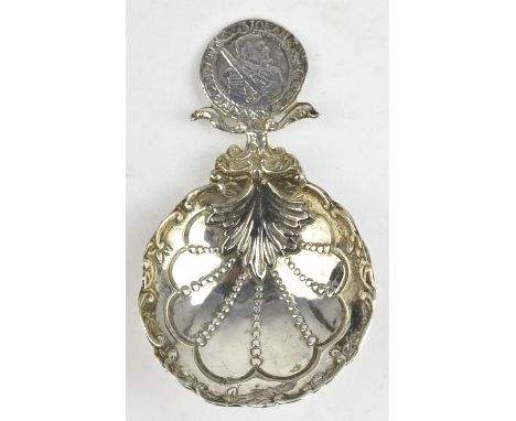 Silver caddy spoon with dolphin and coin handle, Berthold Muller