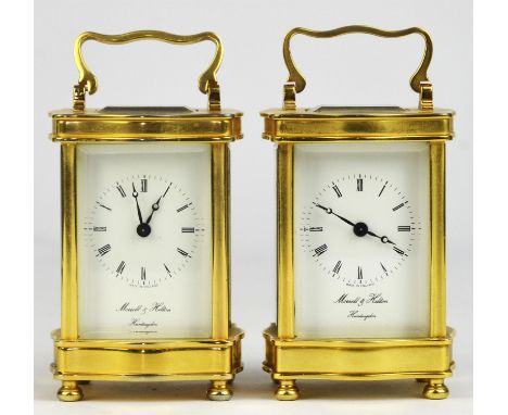 A late 20th century brass cased carriage clock of small proportions.  The white enamel dial detailed 'Morrell & Hilton Huntin