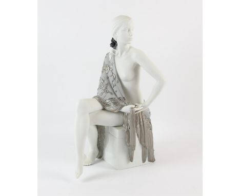 A Lladro bisque porcelain figurine 'Nude with Shawl', raised on an integral square plinth.  42cm highCondition Report:  Black