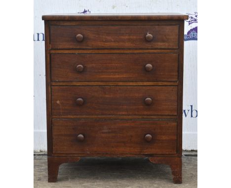 A Regency mahogany small chest of drawers, adapted from a commode, crossbanded and on bracket feet, H 74cm, W 62cm, D 43cm, t
