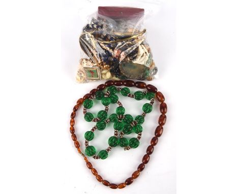 A group of costume jewellery including a bangle, glass bead necklaces, Premier USA anchor link necklace and pendant, enamel l