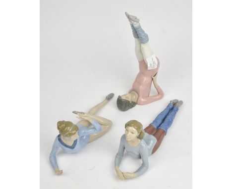 Set of 3 Lladro Gymnasts 'Push-ups' Model 01005334, 'Floor Exercise' Model 01005335 & 'Model 01005336.Gymnast with ring Model