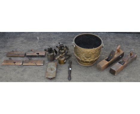 A group of woodworking tools, 1st quarter 20th century, to include two large beechwood planes, four smaller planes, a spokesh