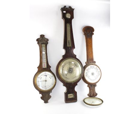 A Victorian mahogany banjo barometer, by Hoyhes Swindon, H 107cm, together with two oak aneroid barometers, early 20th centur