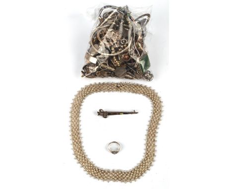 A group of mainly silver items including a charm bracelet with ice skating boot and cuckoo clock charms, a rope chain with cr