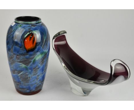 Poole pottery vase, 33cm high, together with a glass boat shaped dish, bears signature, 24cm high x 49cm wide (2)