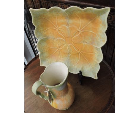 A Beswick pottery dish of square leaf form, the gold/light blue mottled glazed bodty moulded with stylised flowers, impress m