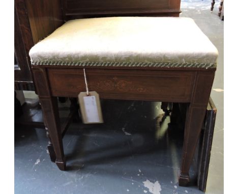 An Edwardian marquetry inlaid mahogany box seat piano stool.