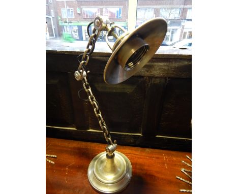 A nickel plated industrial style table lamp with circular shade and chain link column,  H. 70cm.