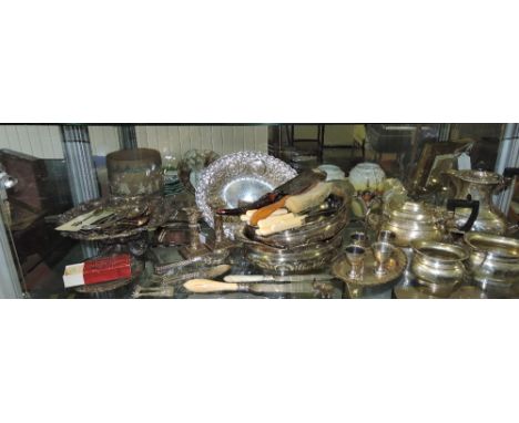 A quantity of assorted Victorian and later platedware including a pair of Goldsmiths and silversmiths Company dwarf candlesti