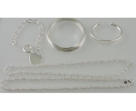 A multi-ring white metal bangle stamped 925, together with two short necklaces, a tork bangle and a bracelet, 5.5g (5).