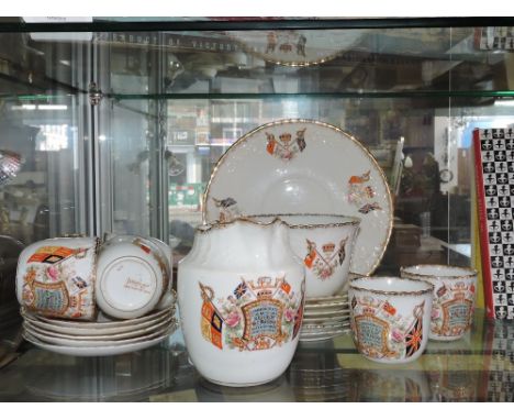 A Victorian commemorative part tea service, originally for six place settings, with vignettes commemorating 60 years of the r
