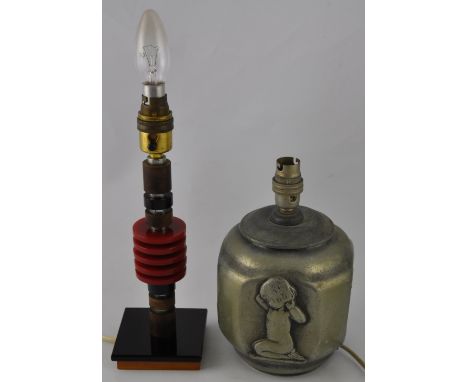 An early 20th century lucite table lamp, the columnar support with arrangement of red disks, H. 30cm, together with another c