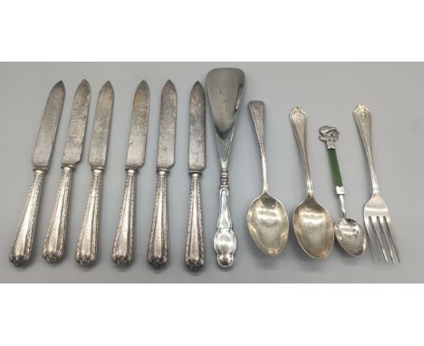 A Selection of silver marked items; Birmingham silver fork and spoon set, London silver tea spoon, Sterling silver and jade k