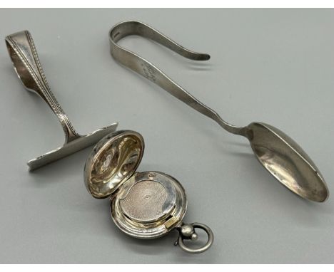 Chester silver Sovereign holder produced by Smith &amp; Bartlam. Birmingham silver push utensil and 925 silver spoon. 