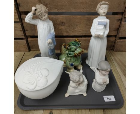 Tray of collectables; Kaiser lidded dish, Two matt finish Lladro angel figures, Nao figures and Chinese green glaze foo dog s