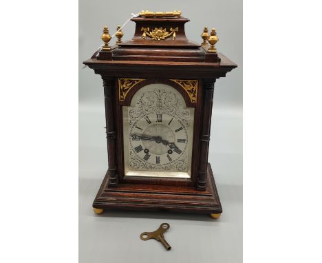 Antique 19th century mantle clock, Lenzkirch A.U.G. Movement. Oak casing fitted with brass ormolu mounts/ finals and swing ha