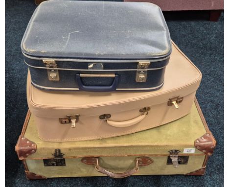 Military canvas and leather bound military travel trunk and two vintage travel cases. 